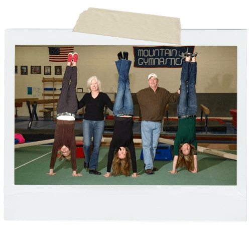 The Baretta family doing handstands together